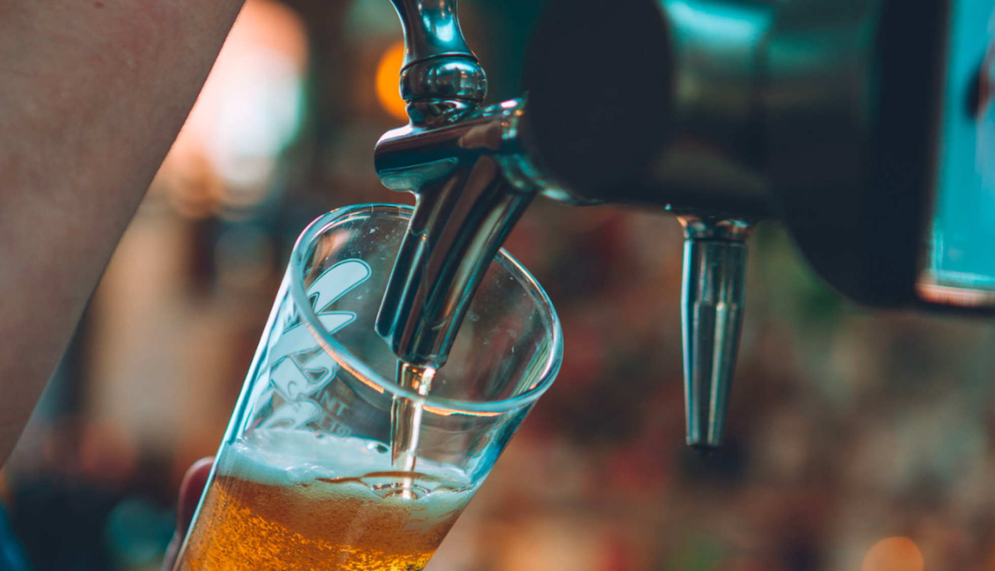 Pint of beer being poured